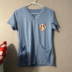 Light Blue V-Neck Scrub Top with Smiley Patch